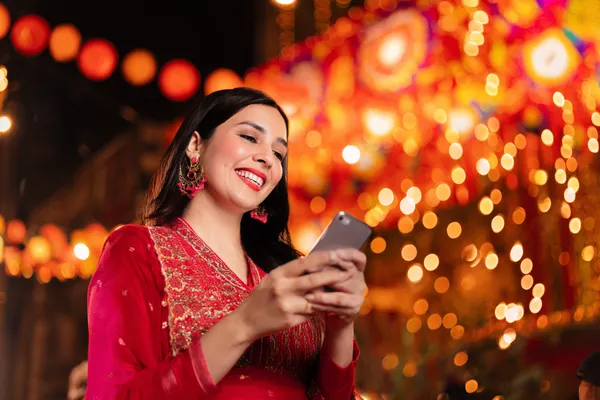 A stylish woman beside vibrant slot machines displaying glowing sevens, showcasing the variety of top slots at LUCKYBANGLA88.